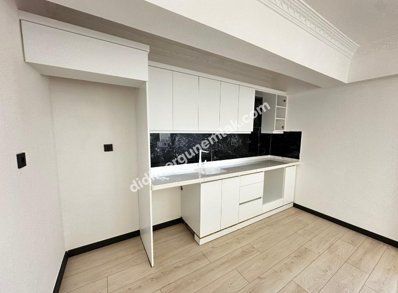 DİDİM ÇAMLIK MAHALLESİNDE DENİZE YÜRÜYÜŞ MESAFESİNDE,TAMAMEN YENİLENMİŞ EFSANE FİYATLI MASRAFSIZ VE ŞIK 2+1 SATILIK DAİRE!