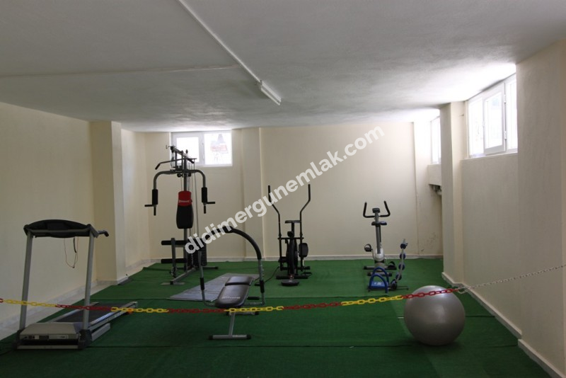 DİDİM EFELER MAHALLESİNDE HAVUZ CEPHELİ ,MODERN SİTEDE FERAH 2+1 SATILIK DAİRE