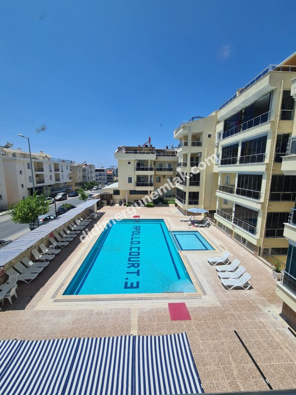 DİDİM EFELER MAHALLESİNDE HAVUZ CEPHELİ ,MODERN SİTEDE FERAH 2+1 SATILIK DAİRE