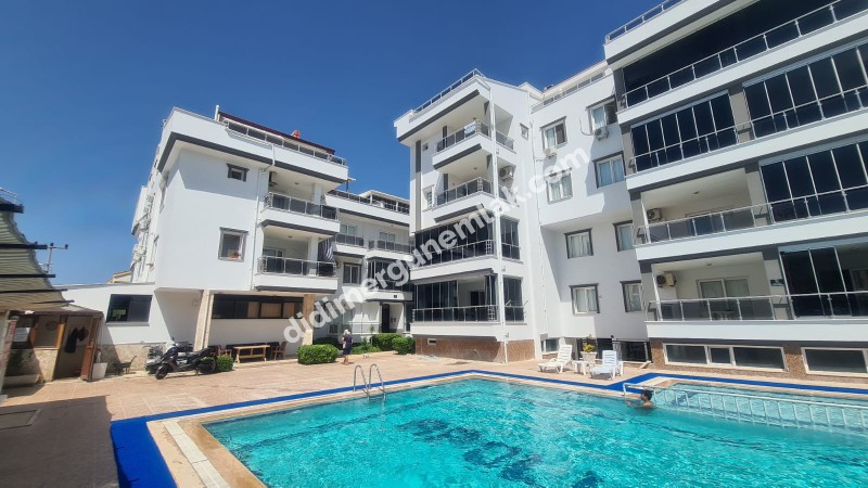 DİDİM EFELER MAHALLESİNDE HAVUZ CEPHELİ ,MODERN SİTEDE FERAH 2+1 SATILIK DAİRE