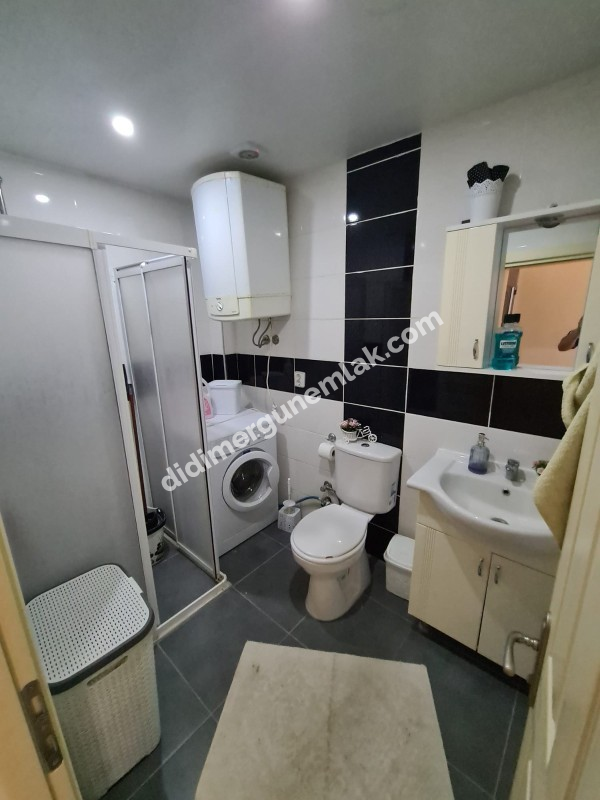 DİDİM EFELER MAHALLESİNDE HAVUZ CEPHELİ ,MODERN SİTEDE FERAH 2+1 SATILIK DAİRE