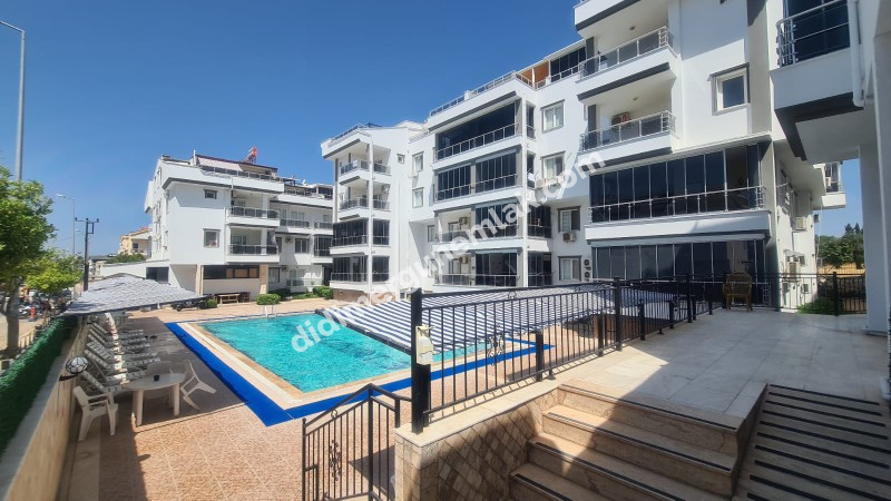 DİDİM EFELER MAHALLESİNDE HAVUZ CEPHELİ ,MODERN SİTEDE FERAH 2+1 SATILIK DAİRE