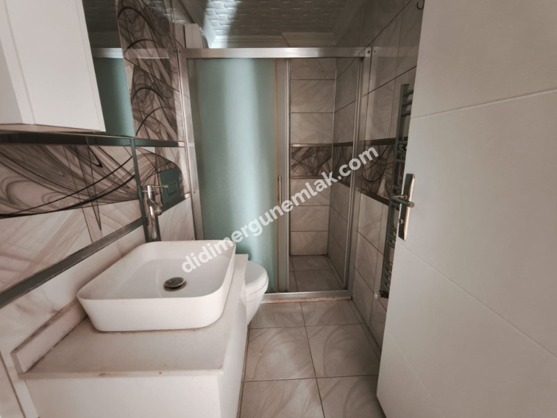 DİDİM CUMHURİYET MAHALLESİ’NDE ÇARŞI MERKEZİNE YAKIN HAVUZLU SİTE İÇERİSİNDE SATILIK 3+1 DAİRE