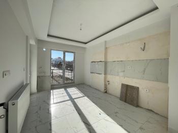 Güvenay - Çorum Gülabibey Kapaklı 1. Cadde Üzeri Satılık Sıfır 3+1 Daire 