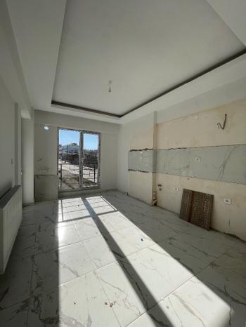 Güvenay - Çorum Gülabibey Kapaklı 1. Cadde Üzeri Satılık Sıfır 3+1 Daire 