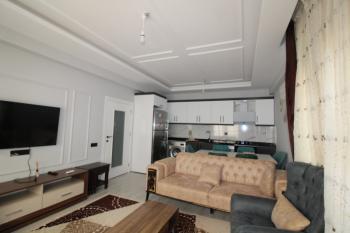 ASLAN'DAN KUYULUK'TA HAVUZLU SİTE İÇİ FULL EŞYALI KİRALIK 2+1