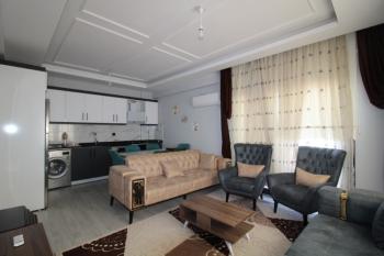 ASLAN'DAN KUYULUK'TA HAVUZLU SİTE İÇİ FULL EŞYALI KİRALIK 2+1