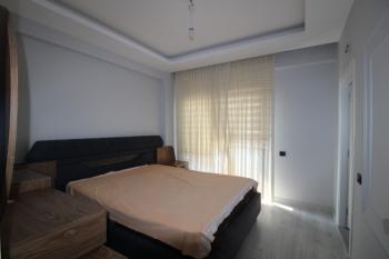 ASLAN'DAN KUYULUK'TA HAVUZLU SİTE İÇİ FULL EŞYALI KİRALIK 2+1