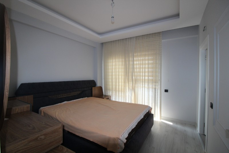 ASLAN'DAN KUYULUK'TA HAVUZLU SİTE İÇİ FULL EŞYALI KİRALIK 2+1