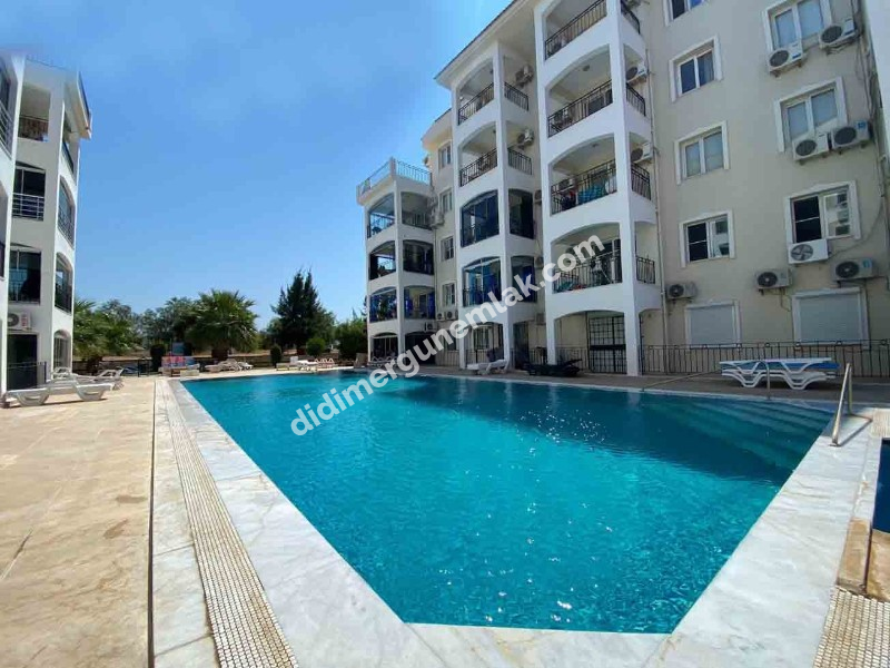 DİDİM ÇAMLIK MAHALLESİNDE HAVUZLU SİTE İÇİNDE EŞYALI KAÇIRILMAYACAK 3+1 AYRI MUTFAKLI ASANSÖRLÜ FIRSAT DAİRE!