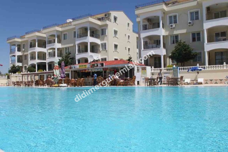 DİDİM ÇAMLIK MAHALLESİNDE HAVUZLU SİTE İÇİNDE EŞYALI KAÇIRILMAYACAK 3+1 AYRI MUTFAKLI ASANSÖRLÜ FIRSAT DAİRE!