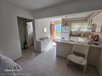 KUŞADASINDA PLAJA VE DENİZE  200 METRE SİTE İÇERİSİNDE SATILIK DAİRESİ