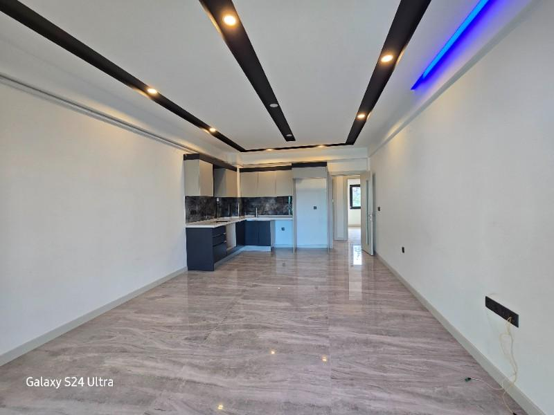 KUŞADASI HAVUZLU DOĞALGAZLI SATILIK 2+1 DAİRE