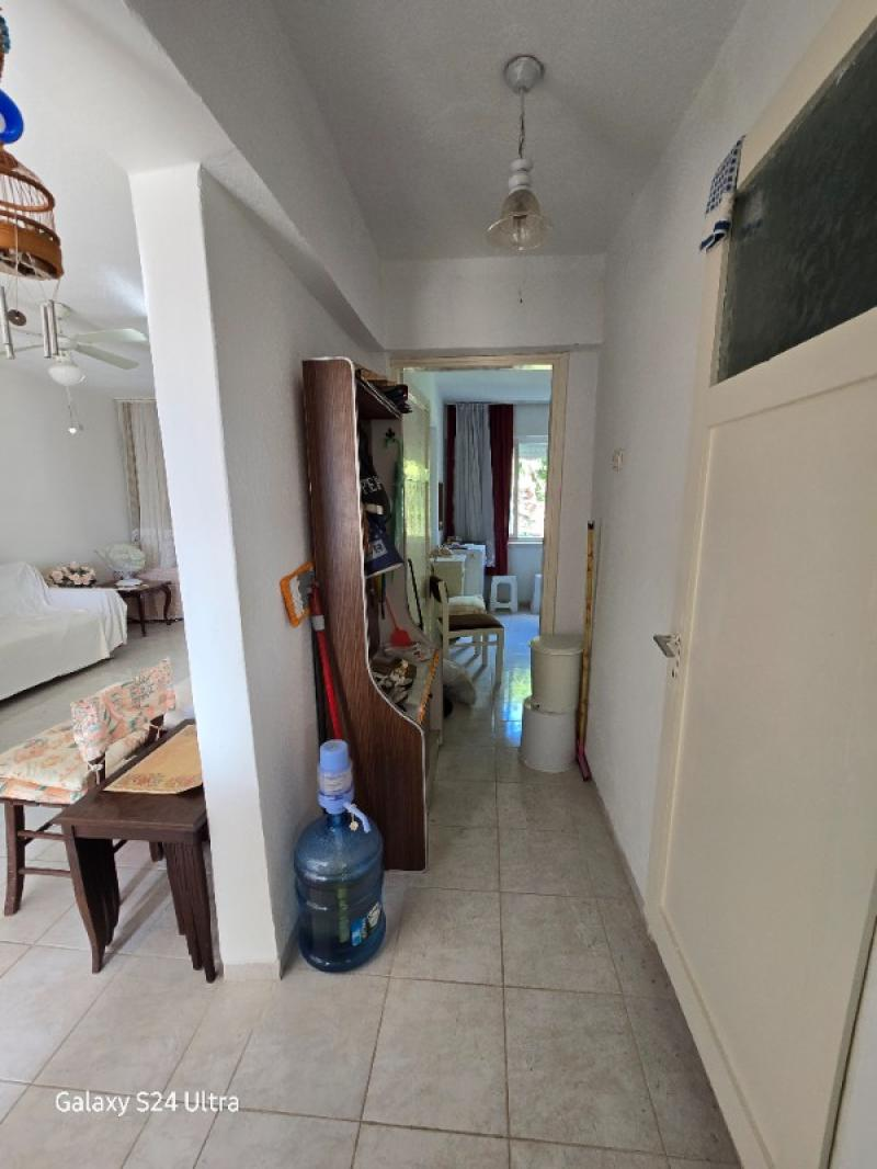 KUŞADASINDA PLAJA VE DENİZE  200 METRE SİTE İÇERİSİNDE SATILIK DAİRESİ