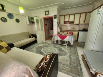 DİDİM ÇAMLIK MAHALLESİNDE DENİZE SADECE 500 METRE YÜRÜME MESAFESİNDE EMSALLERİNE GÖRE UYGUN 2+1 AÇIK MUTFAKLI SATILIK FIRSAT DAİRE