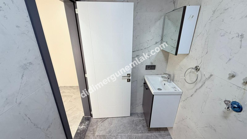  ALTINKUM’DA HAVUZLU SİTE İÇERİSİNDE DENİZE 400 MT MESAFEDE BAHÇE KATTA 2+1 AÇIK MUTFAKLI SIFIR DAİRE 