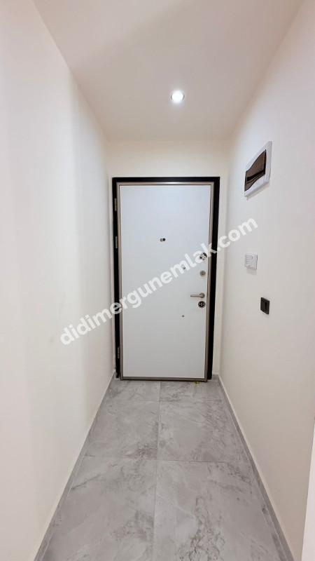  ALTINKUM’DA HAVUZLU SİTE İÇERİSİNDE DENİZE 400 MT MESAFEDE BAHÇE KATTA 2+1 AÇIK MUTFAKLI SIFIR DAİRE 