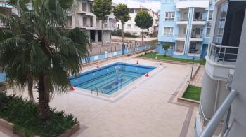  DİDİM EFELER MAHALLESİ'NDE GÜVENLİKLİ SİTE İÇERİSİNDE HAVUZLU 2+1 AÇIK MUTFAKLI SATILIK DAİRE