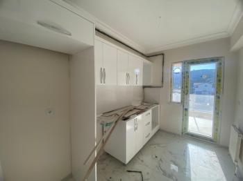 MUDANYA HALİTPAŞA 'da SATILIK 100 M2 AYRI MUTFAKLI DENİZ GÖRÜR SIFIR 2+1 DAİRE