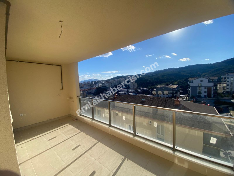 MUDANYA HALİTPAŞA 'da SATILIK 100 M2 AYRI MUTFAKLI DENİZ GÖRÜR SIFIR 2+1 DAİRE