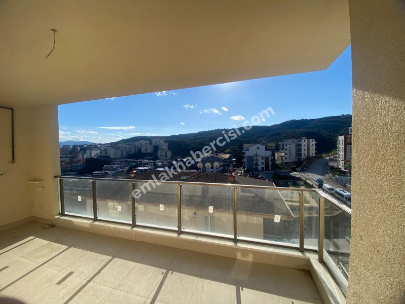 MUDANYA HALİTPAŞA \\\\\\\\\\\\\\\'da SATILIK 100 M2 AYRI MUTFAKLI DENİZ GÖRÜR SIFIR 2+1 DAİRE