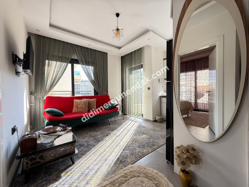  DİDİM ALTINKUM MAHALLESİ'NDE BALKONLU SATILIK 1+1 DAİRE