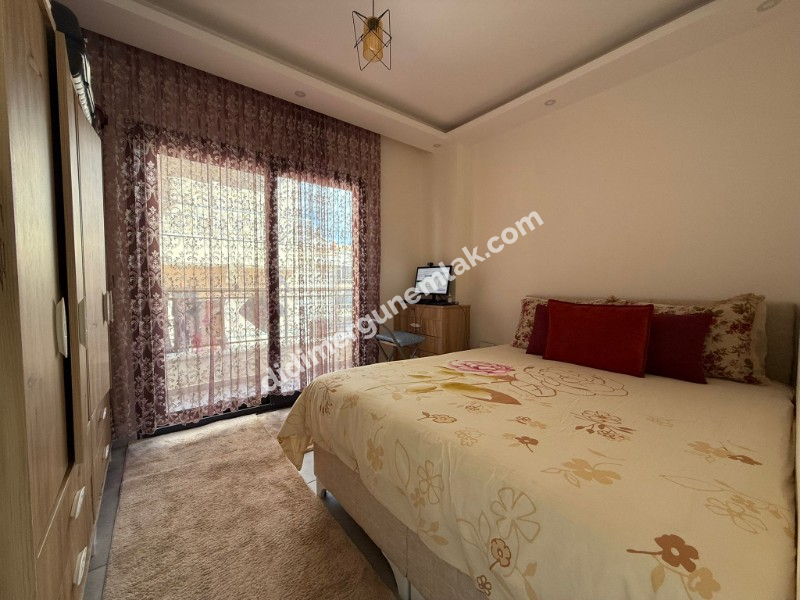  DİDİM ALTINKUM MAHALLESİ'NDE BALKONLU SATILIK 1+1 DAİRE