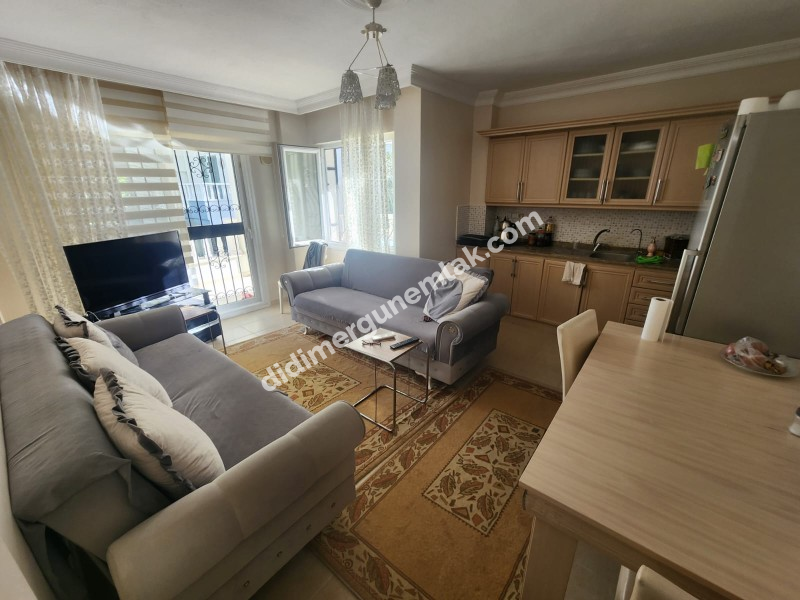 DİDİM ALTINKUM MAHALLESİ’NDE HAVUZ CEPHELİ SATILIK 2+1 DAİRE