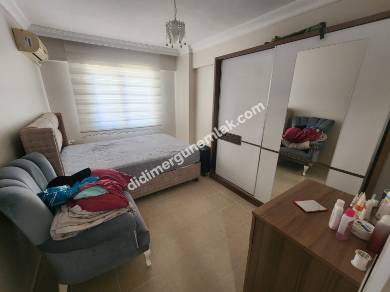 DİDİM ALTINKUM MAHALLESİ’NDE HAVUZ CEPHELİ SATILIK 2+1 DAİRE