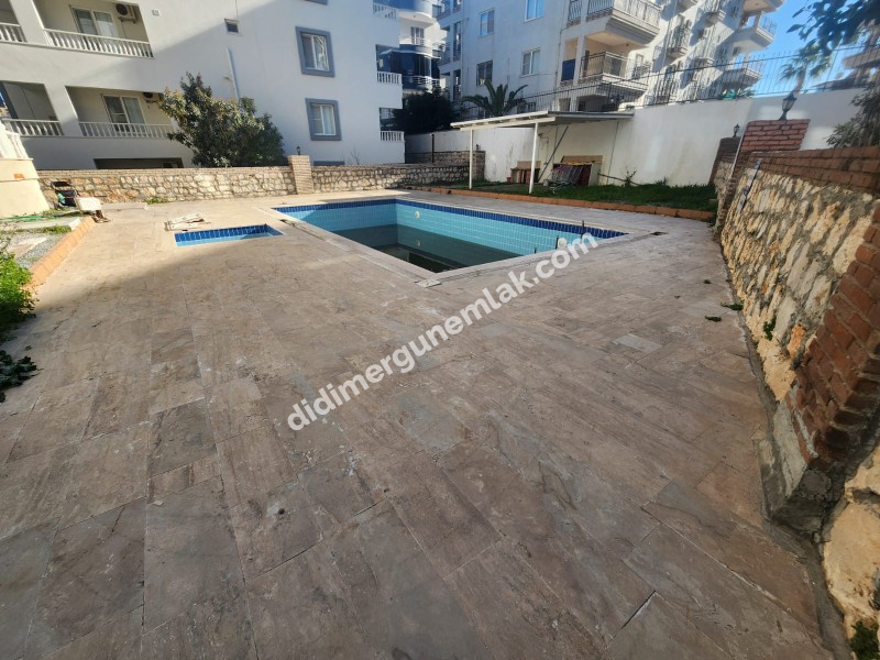 DİDİM ALTINKUM MAHALLESİ’NDE HAVUZ CEPHELİ SATILIK 2+1 DAİRE