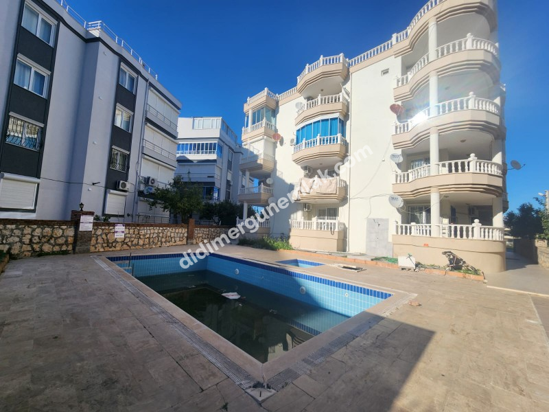 DİDİM ALTINKUM MAHALLESİ’NDE HAVUZ CEPHELİ SATILIK 2+1 DAİRE