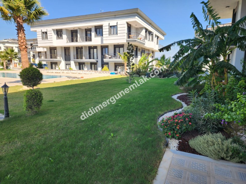 DİDİM CUMHURİYET MAHALLESİ’NDE ULTRA LÜKS, TATİL KÖYÜ KONFORUNDA 2+1 DAİRE FİYAT:5.750.000