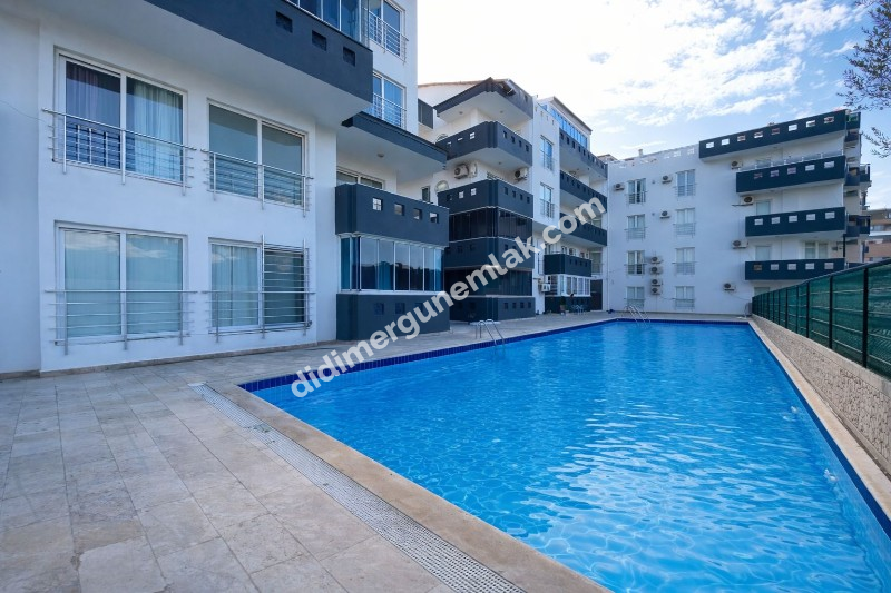 EFELER MAHALLESİ’NDE SATILIK 1+1 EŞYALI HAVUZLU ARA KAT DAİRE FİYAT: 3.650.000TL