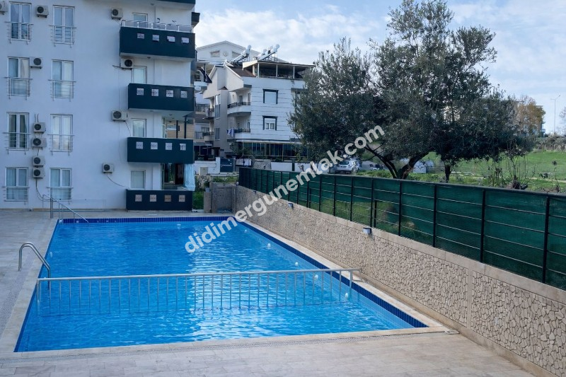 EFELER MAHALLESİ’NDE SATILIK 1+1 EŞYALI HAVUZLU ARA KAT DAİRE FİYAT: 3.650.000TL