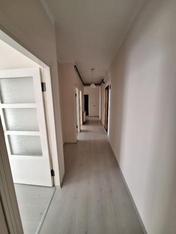 GÜVENAY - ÇORUM BAHÇELİEVLER M. AKİF ERSOY CADDESİ ARA KAT  2+1 SATILIK DAİRE