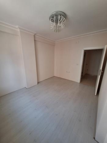 GÜVENAY - ÇORUM BAHÇELİEVLER M. AKİF ERSOY CADDESİ ARA KAT  2+1 SATILIK DAİRE
