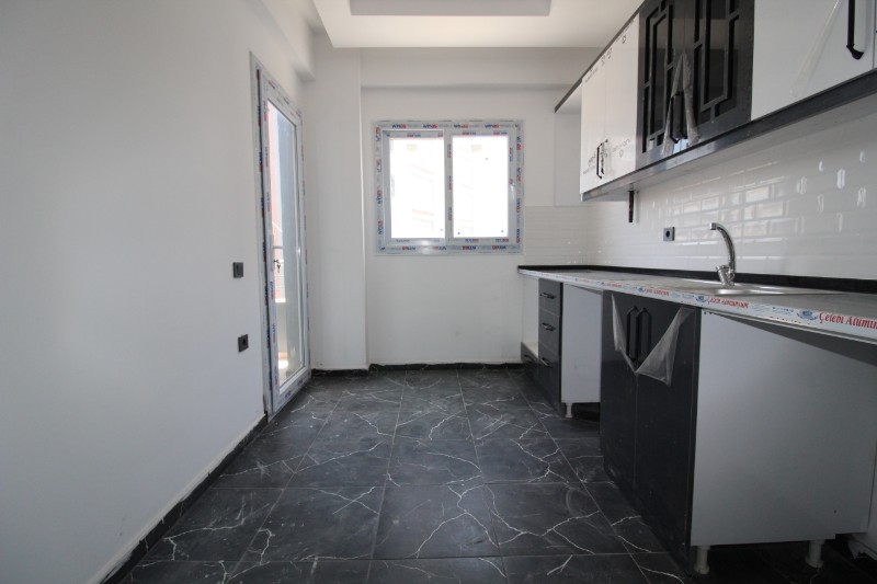 ASLAN'DAN ULAŞIMA YAKIN BAĞIMSIZ MUTFAKLI KİRALIK SIFIR 2+1