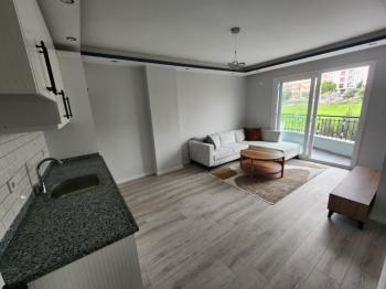 DİDİM YENİ MAHALLE’DE SIFIR BİNADA EŞYALI 2+1 DAİRE