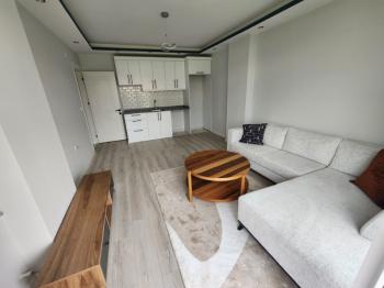 DİDİM YENİ MAHALLE’DE SIFIR BİNADA EŞYALI 2+1 DAİRE