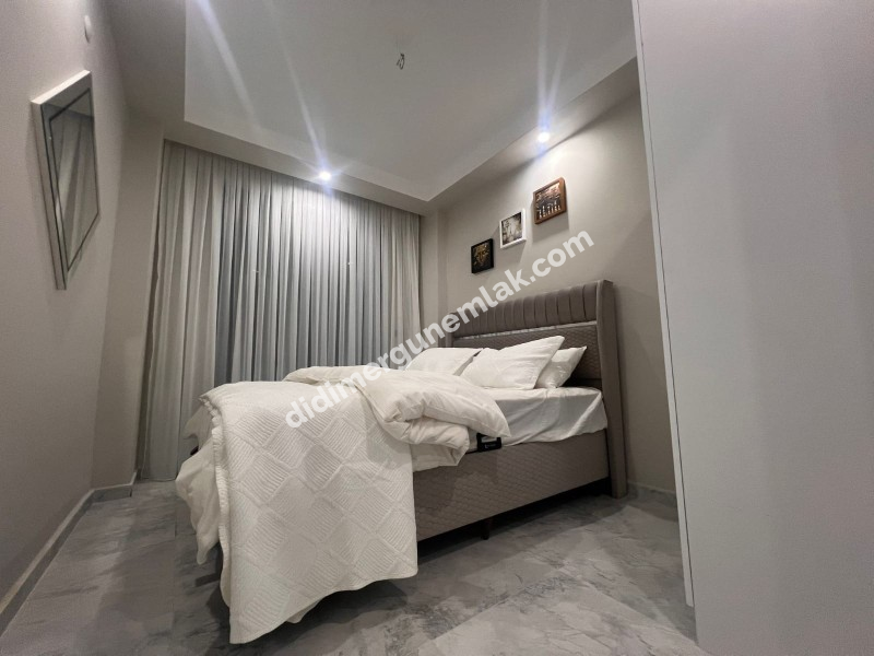 DİDİM ALTINKUM MAHALLESİ’NDE ULTRA LÜKS, EŞYALI 2+1 BAHÇE KATI DAİRE FİYAT: 6.500.000TL