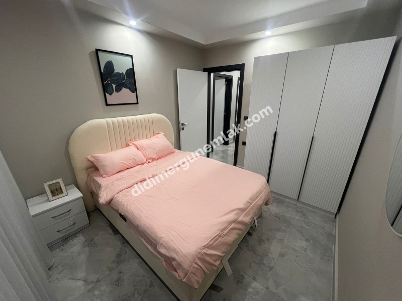 DİDİM ALTINKUM MAHALLESİ’NDE ULTRA LÜKS, EŞYALI 2+1 BAHÇE KATI DAİRE FİYAT: 6.500.000TL