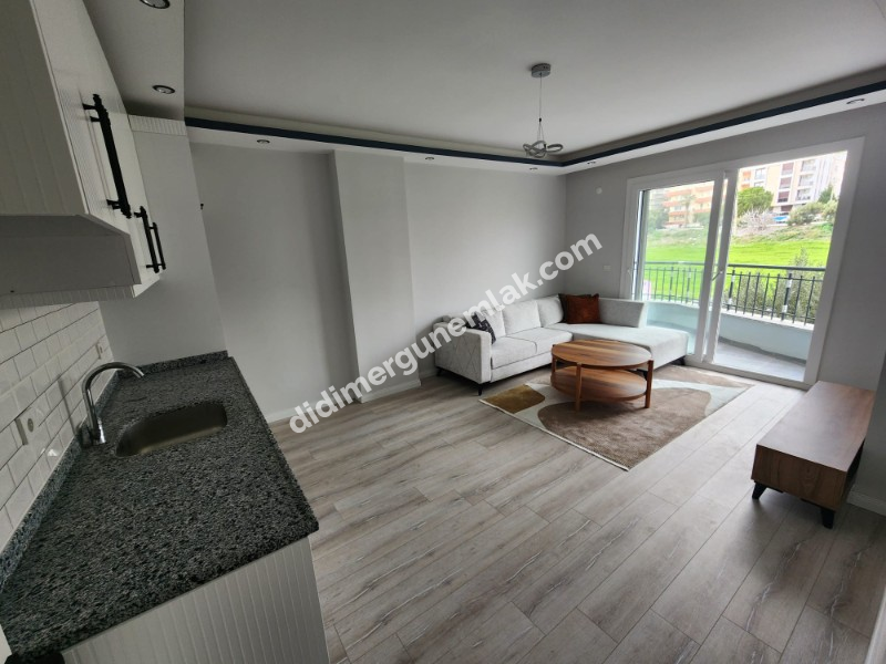 DİDİM YENİ MAHALLE’DE SIFIR BİNADA EŞYALI 2+1 DAİRE