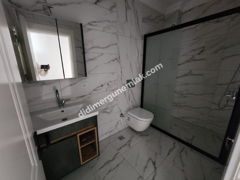 DİDİM YENİ MAHALLE’DE SIFIR BİNADA EŞYALI 2+1 DAİRE