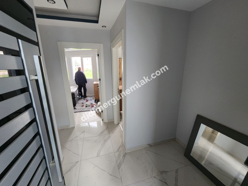 DİDİM YENİ MAHALLE’DE SIFIR BİNADA EŞYALI 2+1 DAİRE