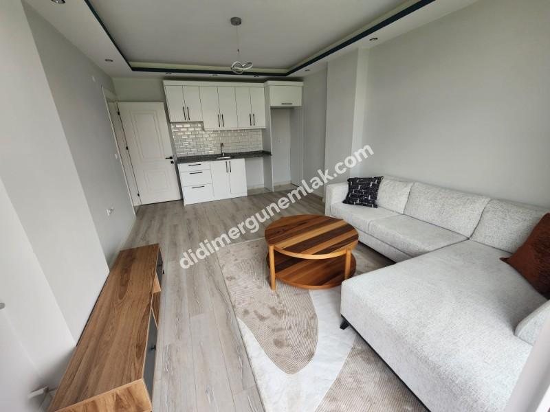 DİDİM YENİ MAHALLE’DE SIFIR BİNADA EŞYALI 2+1 DAİRE