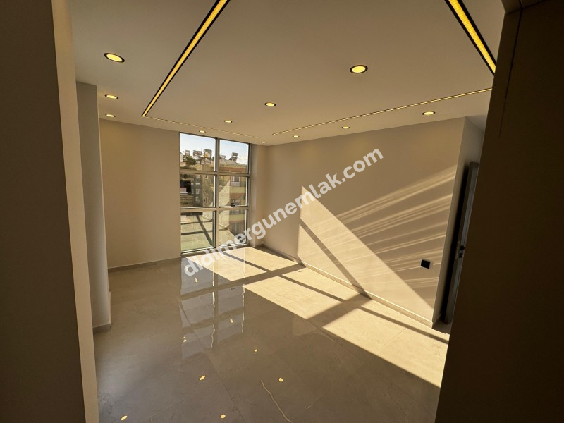 CUMHURİYET MAHALLESİ'NDE 2+1 SIFIR GENİŞ BAHÇE KULLANIMLI SATILIK DAİRE