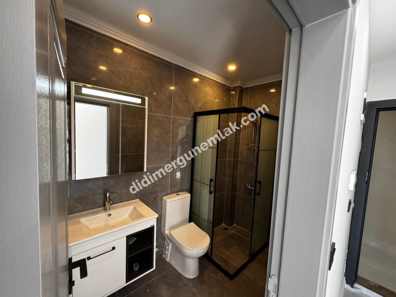 CUMHURİYET MAHALLESİ'NDE 2+1 SIFIR GENİŞ BAHÇE KULLANIMLI SATILIK DAİRE