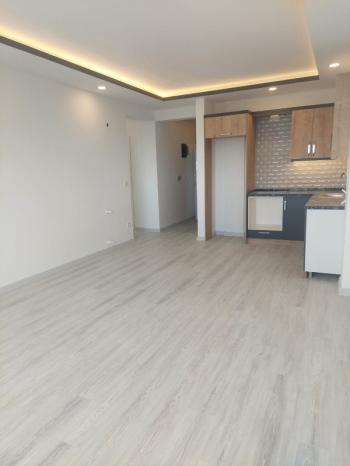 KUŞADASINDA DENİZ MANZARALI HAVUZLU SATILIK 2+1DAİRELER