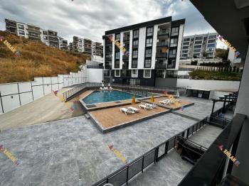 KUŞADASINDA SİTE İÇİNDE HAVUZLU SATILIK DAİRE