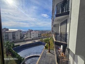 KUŞADASI DENİZ MANZARALI DOĞALGAZLI HAVUZLU SATILIK 3+1 DAİRE